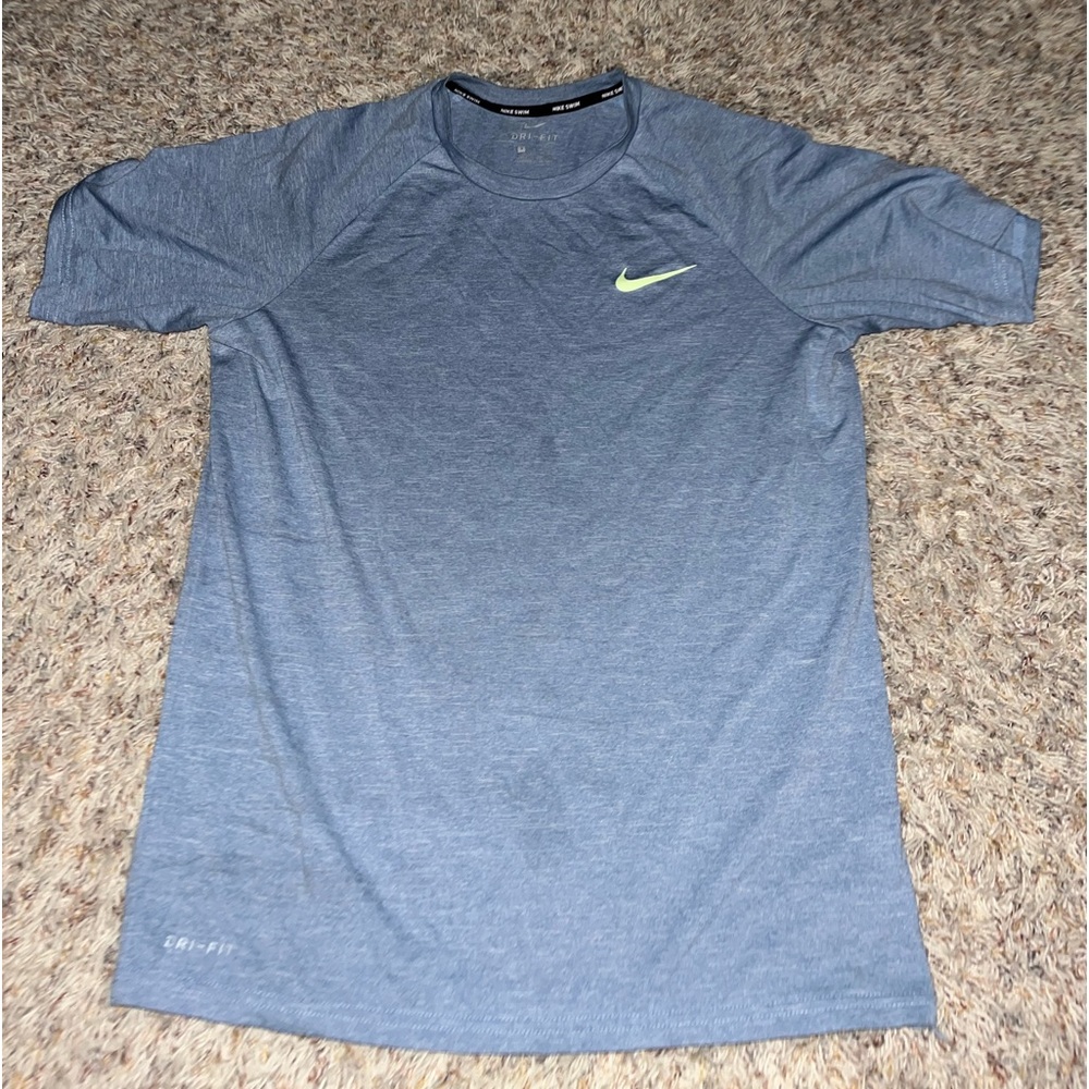 Three Nike Swim shirts